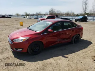 2016 Ford Focus Titanium с VIN 1FADP3J24GL272970, выставлен на аукционе Copart как лот 54539215 с пробегом 60 007 миль миль и Чистый • Clean title. История ставок и продаж доступна на DreamBid. Изображение 1.