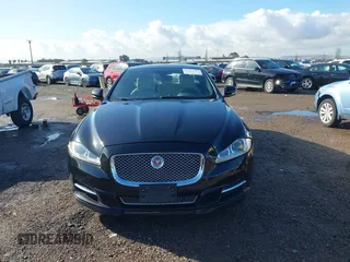 2015 Jaguar XJ with VIN SAJWA1CZ2F8V84677, listed as a IAAI auction lot 41723372 with 52,888 mi miles. Bid and sale history available at carsss.com. Image 12.