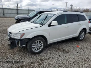 2014 Dodge Journey SXT z VIN 3C4PDDBG4ET297546, wystawiony jako Copart lot #51482855 z przebiegiem 177 630 mil mil oraz Szkoda całkowita • Salvage title. Historia ofert i sprzedaży dostępna na DreamBid. Obrazek 1.