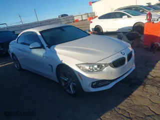 2016 BMW 4 Series 428i with VIN WBA3V7C54G5A28413, listed as a IAAI auction lot 41879939 with 86,000 mi miles. Bid and sale history available at carsss.com. Image 1.