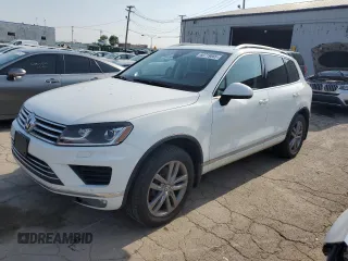 2016 Volkswagen Touareg Sport с VIN WVGEP9BPXGD005351, выставлен на аукционе Copart как лот 60719065 с пробегом 133 674 миль миль и Чистый • Clean title. История ставок и продаж доступна на DreamBid. Изображение 1.