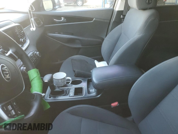 2019 Kia Sorento L z VIN 5XYPG4A35KG478504, wystawiony jako Copart lot #81063734 z przebiegiem Nie podano mil oraz Nie do naprawy • Non repairable. Historia ofert i sprzedaży dostępna na DreamBid. Obrazek 7.