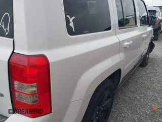 2014 Jeep Patriot Latitude with VIN 1C4NJPFB8ED717749, listed as a IAAI auction lot 41962155 with 147,755 mi miles and . Bid and sale history available at carsss.com. Image 21.