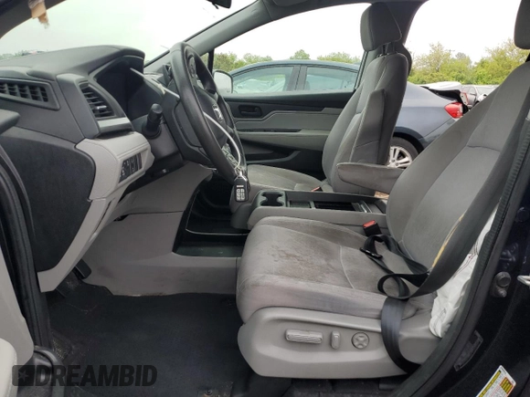 2018 Honda Odyssey EX with VIN 5FNRL6H57JB103291, listed as a Copart auction lot 58733025 with 177,279 mi miles and Salvage title. Bid and sale history available at DreamBid. Image 7.