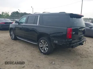 2015 Chevrolet Suburban LTZ with VIN 1GNSCKKCXFR731873, listed as a IAAI auction lot 42069917 with 108,963 mi miles and . Bid and sale history available at DreamBid. Image 3.