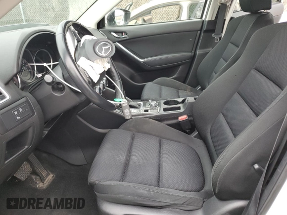2016 Mazda CX-5 Touring with VIN JM3KE2CY4G0605549, listed as a Copart auction lot 51176155 with 0 mi miles and Salvage Title. Bid and sale history available at carsss.com. Image 7.