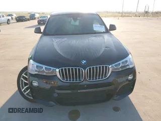 2018 BMW X4 xDrive28i with VIN 5UXXW3C59J0T80560, listed as a IAAI auction lot 41734915 with 122,850 mi miles. Bid and sale history available at carsss.com. Image 12.