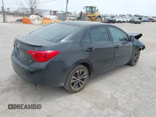 2017 Toyota Corolla L with VIN 2T1BURHE4HC843864, listed as a IAAI auction lot 42274808 with 106,371 mi miles and . Bid and sale history available at DreamBid. Image 4.