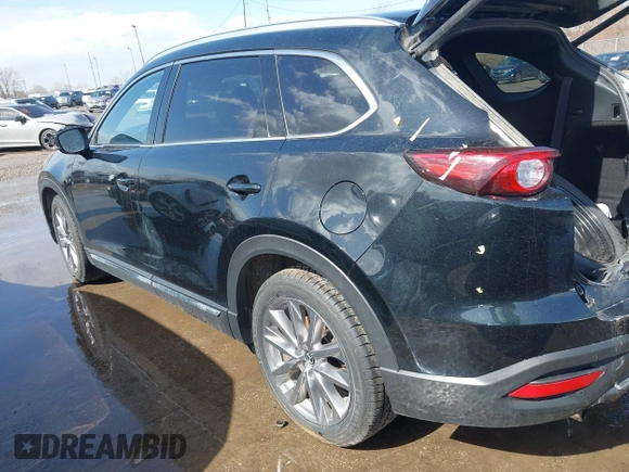 2020 Mazda CX-9 Grand Touring with VIN JM3TCBDY2L0413839, listed as a IAAI auction lot 41720713 with 48,964 mi miles and . Bid and sale history available at DreamBid. Image 15.