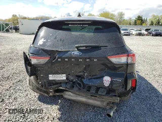 2020 Ford Escape SE z VIN 1FMCU9G6XLUC62391, wystawiony jako Copart lot #55538105 z przebiegiem 76 591 mil mil oraz Szkoda całkowita • Salvage title. Historia ofert i sprzedaży dostępna na DreamBid. Obrazek 6.