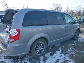 2015 Dodge Grand Caravan SE with VIN 2C4RDGBG3FR653239, listed as a IAAI auction lot 41607222 with 124,732 mi miles and . Bid and sale history available at DreamBid. Image 4.