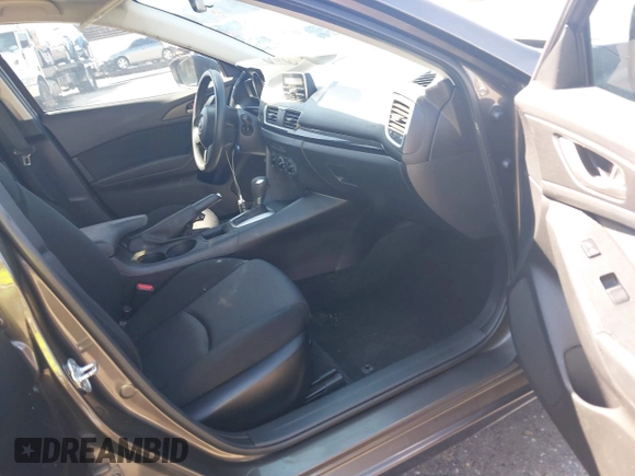 2015 Mazda 3 i SV with VIN JM1BM1T72F1270488, listed as a IAAI auction lot 41827337 with 228,983 mi miles and . Bid and sale history available at DreamBid. Image 5.