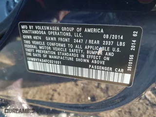 2015 Volkswagen Passat 2.0L TDI SE w/Sunroof with VIN 1VWBV7A34FC021031, listed as a IAAI auction lot 41601548 with 173,402 mi miles. Bid and sale history available at carsss.com. Image 9.