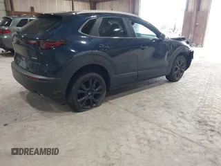 2024 Mazda CX-30 S Select Sport z VIN 3MVDMBBM2RM707143, wystawiony jako IAAI lot #42267284 z przebiegiem 6 133 mil mil oraz . Historia ofert i sprzedaży dostępna na DreamBid. Obrazek 4.