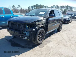 2015 Dodge Durango SXT with VIN 1C4RDJAG3FC695918, listed as a IAAI auction lot 41715629 with 143,460 mi miles and . Bid and sale history available at DreamBid. Image 2.
