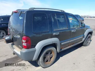 2005 Jeep Liberty Sport with VIN 1J4GL48K35W599784, listed as a IAAI auction lot 41886847 with 174,943 mi miles and . Bid and sale history available at DreamBid. Image 4.