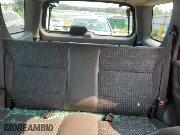 2002 Ford Escape XLS Choice z VIN 1FMYU01102KB13125, wystawiony jako Copart lot #59034495 z przebiegiem 202 253 mil mil oraz Szkoda całkowita • Salvage title. Historia ofert i sprzedaży dostępna na DreamBid. Obrazek 10.