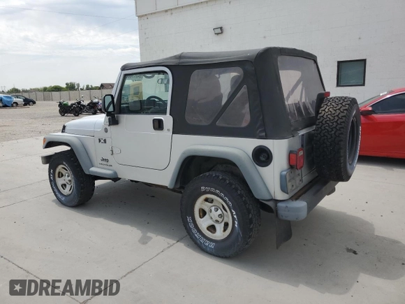 2004 Jeep Wrangler X with VIN 1J4FA39S94P747200, listed as a Copart auction lot 64617535 with 151,224 mi miles and Clean title. Bid and sale history available at DreamBid. Image 2.