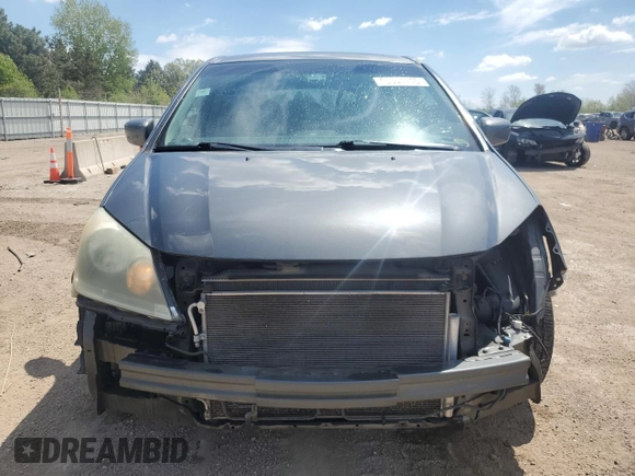 2008 Honda Odyssey EX-L z VIN 5FNRL38748B408516, wystawiony jako Copart lot #55394745 z przebiegiem 144 176 mil mil oraz Szkoda całkowita • Salvage title. Historia ofert i sprzedaży dostępna na DreamBid. Obrazek 5.