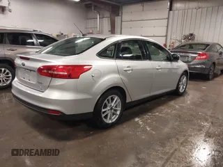 2015 Ford Focus SE with VIN 1FADP3F28FL357382, listed as a IAAI auction lot 41223441 with 47,682 mi miles. Bid and sale history available at carsss.com. Image 4.