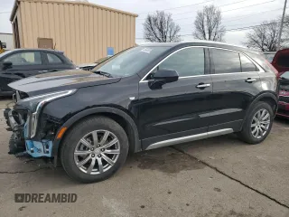 2020 Cadillac XT4 AWD Premium Luxury with VIN 1GYFZDR41LF066291, listed as a Copart auction lot 45876515 with 57,211 mi miles and Salvage Title. Bid and sale history available at carsss.com. Image 1.