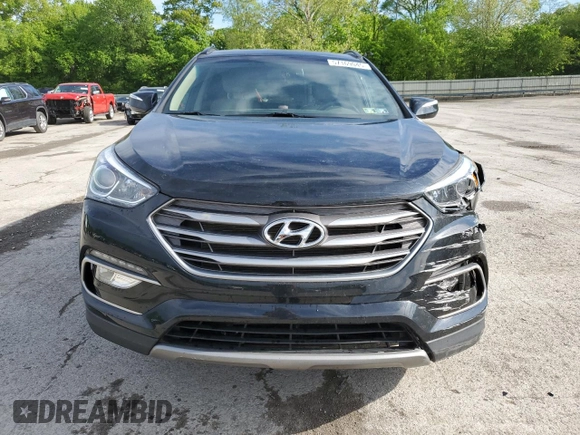 2017 Hyundai Santa Fe 2.4L z VIN 5XYZUDLB1HG412675, wystawiony jako Copart lot #57169045 z przebiegiem 38 947 mil mil oraz Szkoda całkowita • Salvage title. Historia ofert i sprzedaży dostępna na DreamBid. Obrazek 5.