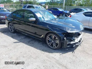 2019 BMW 5 Series M550i xDrive with VIN WBAJB9C51KB289355, listed as a IAAI auction lot 41867984 with 30,106 mi miles and . Bid and sale history available at DreamBid. Image 1.
