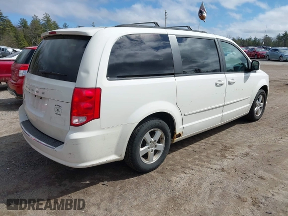 2012 Dodge Grand Caravan SXT with VIN 2C4RDGCGXCR248859, listed as a IAAI auction lot 41829411 with 111,515 mi miles and . Bid and sale history available at DreamBid. Image 4.