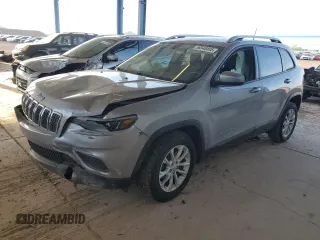 2020 Jeep Cherokee Latitude with VIN 1C4PJLCB1LD543946, listed as a Copart auction lot 56548405 with 112,387 mi miles and Salvage title. Bid and sale history available at DreamBid. Image 1.