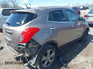 2014 Buick Encore with VIN KL4CJASB4EB783635, listed as a IAAI auction lot 41816882 with 134,758 mi miles. Bid and sale history available at carsss.com. Image 4.
