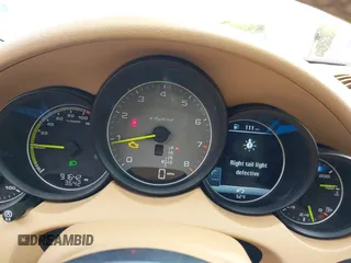 2016 Porsche Cayenne S E-Hybrid z VIN WP1AE2A22GLA17486, wystawiony jako IAAI lot #42229641 z przebiegiem 91 642 mil mil oraz . Historia ofert i sprzedaży dostępna na DreamBid. Obrazek 7.