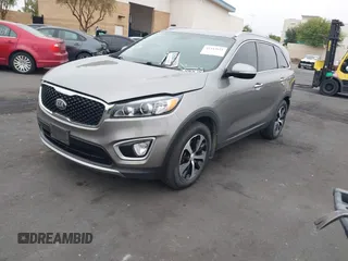 2018 Kia Sorento EX with VIN 5XYPH4A59JG394960, listed as a IAAI auction lot 42342621 with 158,056 mi miles and . Bid and sale history available at DreamBid. Image 2.
