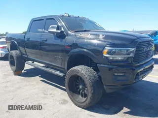 2019 Ram 2500 Laramie with VIN 3C6UR5FLXKG710325, listed as a IAAI auction lot 41853777 with 104,286 mi miles. Bid and sale history available at carsss.com. Image 1.