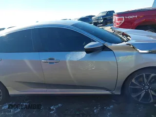 2019 Honda Civic Sport with VIN 2HGFC2F85KH605786, listed as a IAAI auction lot 41621480 with 66,438 mi miles and . Bid and sale history available at DreamBid. Image 14.