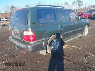 1999 Lexus LX 470 z VIN JT6HT00W9X0031151, wystawiony jako IAAI lot #41436144 z przebiegiem Nie podano mil oraz . Historia ofert i sprzedaży dostępna na DreamBid. Obrazek 4.