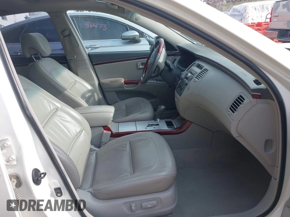 2007 Hyundai Azera SE with VIN KMHFC46F07A139369, listed as a IAAI auction lot 41999327 with 145,827 mi miles and . Bid and sale history available at DreamBid. Image 5.