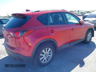 2015 Mazda CX-5 Touring with VIN JM3KE2CY5F0542184, listed as a IAAI auction lot 41770264 with 119,592 mi miles. Bid and sale history available at carsss.com. Image 4.