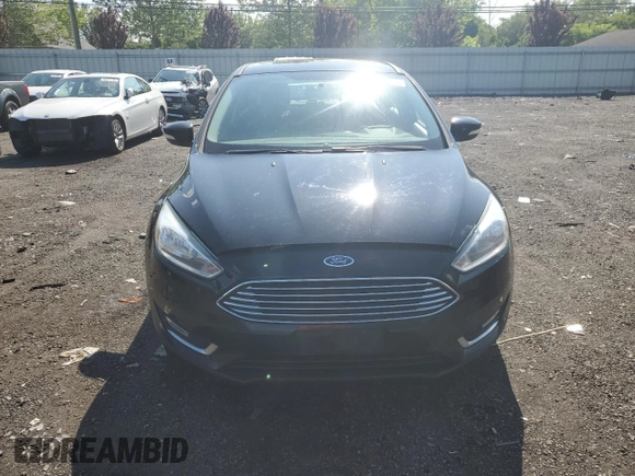 2017 Ford Focus Titanium with VIN 1FADP3N2XHL207729, listed as a Copart auction lot 59184855 with 146,768 mi miles and Salvage title. Bid and sale history available at DreamBid. Image 5.