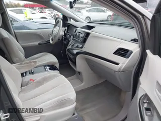 2012 Toyota Sienna LE AAS with VIN 5TDKK3DC5CS253020, listed as a IAAI auction lot 40900034 with 208,421 mi miles. Bid and sale history available at carsss.com. Image 5.