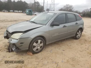 2006 Ford Focus S with VIN 1FAHP37N76W180039, listed as a Copart auction lot 58328565 with 220,696 mi miles and Salvage title. Bid and sale history available at DreamBid. Image 1.