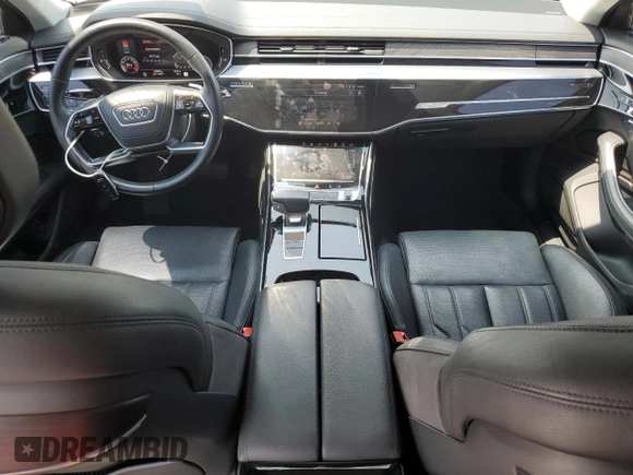 2019 Audi A8 with VIN WAU8DAF82KN020487, listed as a Copart auction lot 60214005 with 75,895 mi miles and Salvage title. Bid and sale history available at DreamBid. Image 8.
