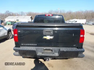 2018 Chevrolet Silverado 1500 LT with VIN 1GCUKREC3JF119906, listed as a IAAI auction lot 41765398 with 122,472 mi miles and . Bid and sale history available at DreamBid. Image 16.