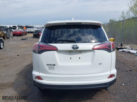 2018 Toyota RAV4 LE with VIN JTMZFREV9JJ192075, listed as a IAAI auction lot 41860513 with 64,586 mi miles. Bid and sale history available at carsss.com. Image 16.