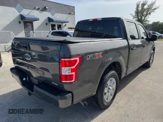 2019 Ford F-150 XL with VIN 1FTEW1CP1KKF22890, listed as a Copart auction lot 61813095 with 63,774 mi miles and Salvage title. Bid and sale history available at DreamBid. Image 3.