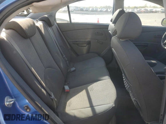 2010 Kia Rio LX with VIN KNADH4A35A6635429, listed as a Copart auction lot 53266835 with 110,615 mi miles and Salvage Title. Bid and sale history available at carsss.com. Image 10.