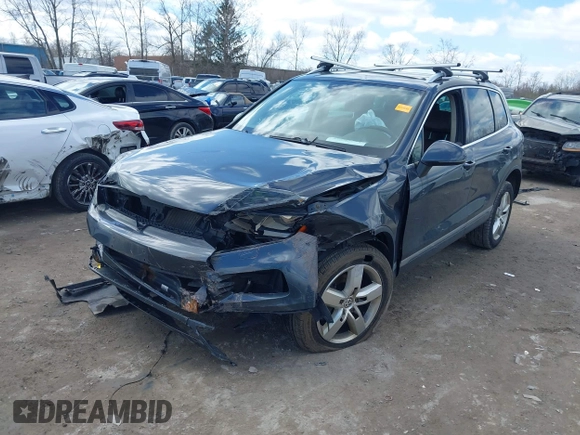 2013 Volkswagen Touareg Lux with VIN WVGEF9BP4DD006851, listed as a IAAI auction lot 41983791 with 115,551 mi miles and . Bid and sale history available at DreamBid. Image 16.
