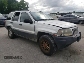 2004 Jeep Grand Cherokee Laredo z VIN 1J4GW48S14C288605, wystawiony jako Copart lot #60204815 z przebiegiem 247 816 mil mil oraz Szkoda całkowita • Salvage title. Historia ofert i sprzedaży dostępna na DreamBid. Obrazek 4.