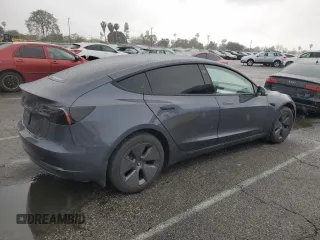 2023 Tesla Model 3 with VIN 5YJ3E1EA5PF640805, listed as a Copart auction lot 48389265 with 28,193 mi miles and Salvage title. Bid and sale history available at DreamBid. Image 3.
