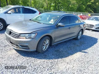 2016 Volkswagen Passat S with VIN 1VWAT7A31GC043362, listed as a IAAI auction lot 42401167 with 166,796 mi miles and . Bid and sale history available at DreamBid. Image 2.