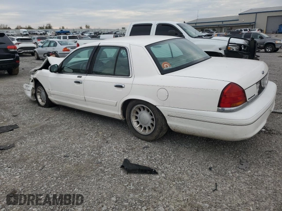 2000 Ford Crown Victoria LX z VIN 2FAFP74W4YX120352, wystawiony jako Copart lot #79833264 z przebiegiem Nie podano mil oraz Szkoda całkowita • Salvage title. Historia ofert i sprzedaży dostępna na DreamBid. Obrazek 2.